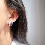 Wholesale Dopamine Enamel Hoop Earrings featuring multicolor enamel drip glaze on petite stackable blue hoops from junejewelry.com—factory price, free shipping