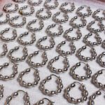 Wholesale Olive Bead U-Shape Hoop Earrings featuring olive seed beads on a copper band plated in 18K gold and platinum from junejewelry.com—factory price, free shipping.