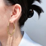 Wholesale Bead Hoop Earrings featuring oversized copper hoops with bamboo segments and round bead accents, plated in 18K gold or platinum from junejewelry.com—factory price, free shipping.