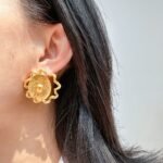 Wholesale Sun Relief Stud Earrings featuring vintage relief sun medallion and twisted ribbon knot on copper with 18K gold or platinum plating from junejewelry.com—factory price, free shipping.