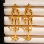 Wholesale chandelier Tassel Earrings featuring genuine cow horn beads and long vibrant tassels on 18K gold plated copper from junejewelry.com—factory price, free shipping.