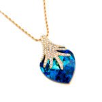 Wholesale Crystal Pave Necklace with blue Swarovski Element teardrop and white crystal pave design on 18K gold plated brass from JuneJewelry.com.
