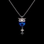 Wholesale Swarovski owl necklace with genuine crystals and platinum‑plated copper from junejewelry.com – cute factory price animal pendant for wholesale.