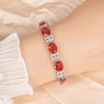 Wholesale Zircon Charm Bracelet featuring clear sparkling stones on platinum plated copper from JuneJewelry.com.