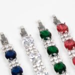 Wholesale Zircon Charm Bracelet featuring clear sparkling stones on platinum plated copper from JuneJewelry.com.