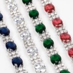 Wholesale Zircon Charm Bracelet featuring clear sparkling stones on platinum plated copper from JuneJewelry.com.