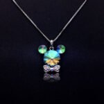 Wholesale Mickey necklace with tie featuring Swarovski elements from junejewelry.com. Cute cartoon character jewelry for resale.