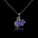 Bulk animal swan pendant necklace with genuine Swarovski crystals and platinum-plated copper—trendy wholesale design from junejewelry.com.