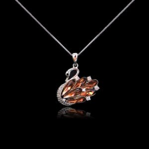 Bulk animal swan pendant necklace with genuine Swarovski crystals and platinum-plated copper—trendy wholesale design from junejewelry.com.