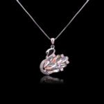 Bulk animal swan pendant necklace with genuine Swarovski crystals and platinum-plated copper—trendy wholesale design from junejewelry.com.