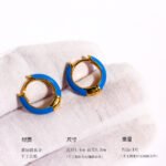 Wholesale Dopamine Enamel Hoop Earrings featuring multicolor enamel drip glaze on petite stackable blue hoops from junejewelry.com—factory price, free shipping