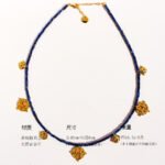 Wholesale lapis lazuli layering necklace featuring lapis beads, a gold coin pendant, shell accents, and 18K gold plated copper from junejewelry.com