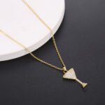 Wholesale Wine Glass Pendant Necklace featuring zircon crystals on platinum-plated copper from junejewelry.com—factory price, free shipping, Ins-style charm.