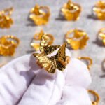 Wholesale Artistic Butterfly Open Ring featuring delicate butterfly motifs on an open copper band plated in 18K gold and platinum from junejewelry.com—factory price, free shipping.
