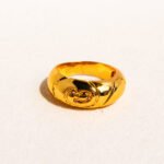 Wholesale Vintage Relief Ring featuring handcrafted relief linework and old-coin motif in 18K gold–plated copper from junejewelry.com—factory price, free shipping.