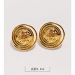 Wholesale Metal big Stud Earrings with mirror-like round button design in 18K gold-plated copper from junejewelry.com—factory price, free shipping.