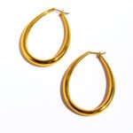 Wholesale Oval Teardrop U-Shape Clip Earrings featuring oversized teardrop and geometric hollow U-shape clip in 18K gold-plated copper from junejewelry.com—factory price, free shipping.