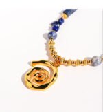 Wholesale lapis lazuli layering necklace featuring lapis beads, a gold coin pendant, shell accents, and 18K gold plated copper from junejewelry.com