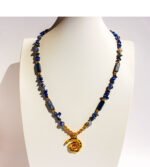 Wholesale lapis lazuli layering necklace featuring lapis beads, a gold coin pendant, shell accents, and 18K gold plated copper from junejewelry.com