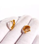 Wholesale Dopamine Enamel Hoop Earrings featuring multicolor enamel drip glaze on petite stackable blue hoops from junejewelry.com—factory price, free shipping