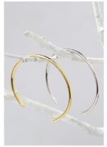 Wholesale CZ open cuff bangle featuring a minimalist design and 14K gold plated brass from junejewelry.com