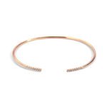 Wholesale cubic zirconia cuff bracelet featuring a minimalist design and 14K gold plated copper from junejewelry.com
