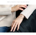 Wholesale cubic zirconia cuff bracelet featuring a minimalist design and 14K gold plated copper from junejewelry.com