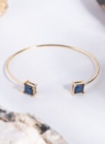 Wholesale cz cuff bracelet featuring a minimalist design and 14K gold plated copper from junejewelry.com