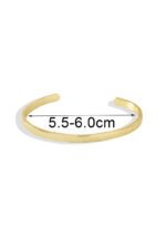 Wholesale Good Luck cuff bracelet featuring a minimalist design and 14K gold plated copper from junejewelry.com