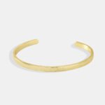 Wholesale Good Luck cuff bracelet featuring a minimalist design and 14K gold plated copper from junejewelry.com