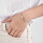Wholesale Good Luck cuff bracelet featuring a minimalist design and 14K gold plated copper from junejewelry.com