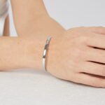 Wholesale Good Smile cuff bracelet featuring a minimalist design and 14K gold plated copper from junejewelry.com