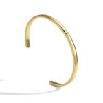 Wholesale single CZ cuff bracelet featuring a minimalist design and 14K gold plated copper from junejewelry.com