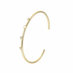 Wholesale circle CZ cuff bracelet featuring a minimalist design and 14K gold plated copper from junejewelry.com