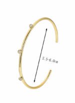 Wholesale CZ cuff bracelet featuring a minimalist design and 14K gold plated copper from junejewelry.com