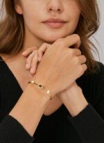 Wholesale opal cuff bracelet featuring a minimalist design and 14K gold plated copper from junejewelry.com
