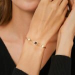 Wholesale opal cuff bracelet featuring a minimalist design and 14K gold plated copper from junejewelry.com