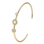Wholesale European-style opal cuff bracelet featuring a minimalist design with a hexagonal synthetic opal and 14K gold plated copper from junejewelry.com