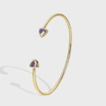 Wholesale geometric zirconia bracelet featuring a minimalist design with triangular CZ stones and 14K gold plated copper from junejewelry.com