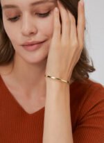 Wholesale geometric cuff bracelet featuring a minimalist geometric design and 14K gold plated copper from junejewelry.com