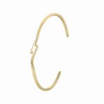 Wholesale lightning cuff bracelet featuring a minimalist lightning bolt design and 14K gold plated copper from junejewelry.com