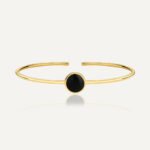 Wholesale European-style black agate cuff bracelet featuring a minimalist design and 14K gold plated copper from junejewelry.com