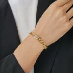 Wholesale European-style hip hop cuff bracelet featuring a minimalist design and 14K gold plated copper from junejewelry.com