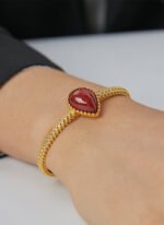 Wholesale European-style red agate cuff bracelet featuring a minimalist design and 14K gold plated copper from junejewelry.com