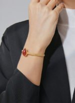 Wholesale European-style red agate cuff bracelet featuring a minimalist design and 14K gold plated copper from junejewelry.com