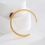 Wholesale European-style red agate cuff bracelet featuring a minimalist design and 14K gold plated copper from junejewelry.com