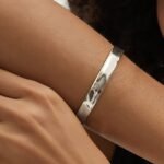 Wholesale European-style modern cuff bracelet featuring a minimalist design and 14K gold plated copper from junejewelry.com