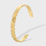 Wholesale European-style modern cuff bracelet featuring a minimalist design and 14K gold plated copper from junejewelry.com