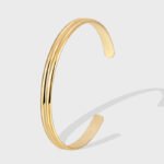 Wholesale European-style minimalist U shape cuff bracelet featuring a 14k gold plated copper design from junejewelry.com
