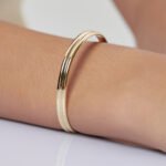 Wholesale European-style minimalist U shape cuff bracelet featuring a 14k gold plated copper design from junejewelry.com